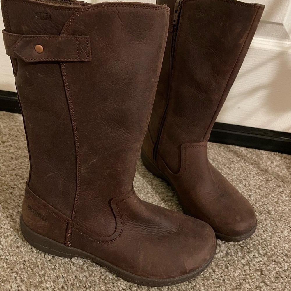 Merrell boots with rubber soles.